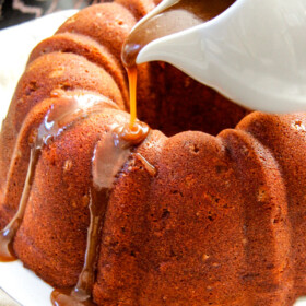 My FAVORITE apple cake! Toffee Apple Pound Cake with the most incredible Spiced Caramel bursting with sweet toffee bits and apples in every bite! Everyone goes crazy over this cake!