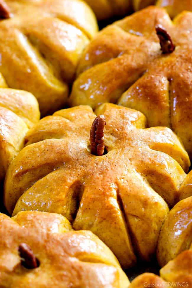 Fluffy, soft and tender Pumpkin in Dinner Rolls will be the talk of your Thanksgiving Table! Adorably delicious and easier than you might think!