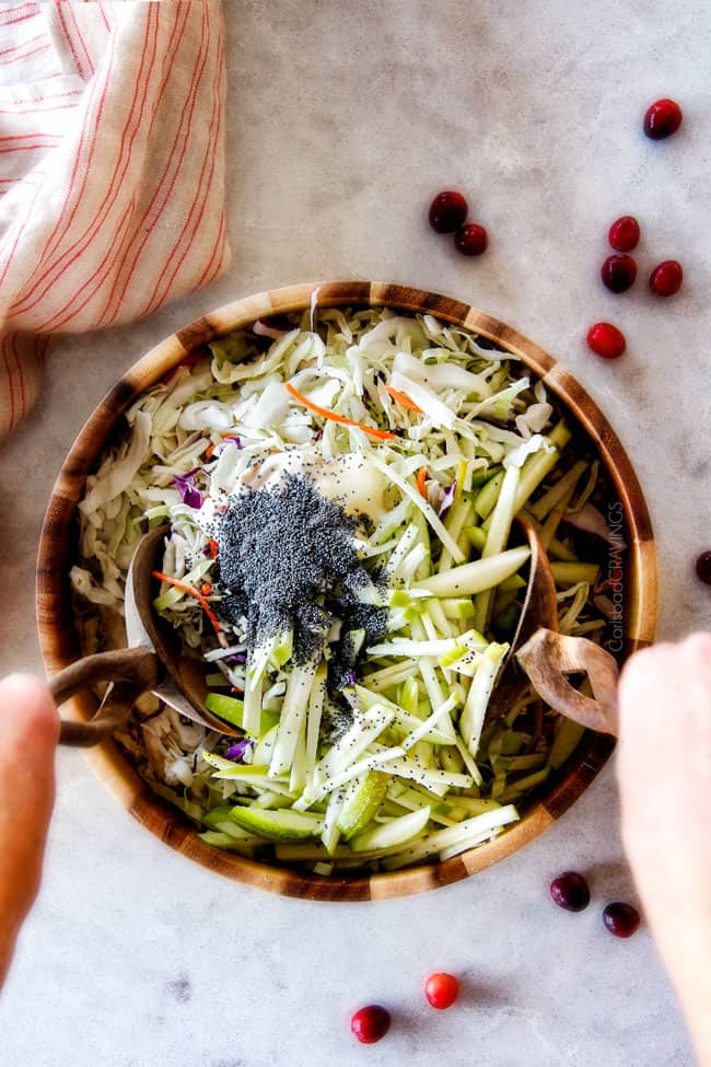 20 Minute Chipotle BBQ Cranberry Turkey Sliders (or chicken!) are a wonderfully delicious way to devour your Thanksgiving turkey leftovers or SO good you will want to make them forever and ever with chicken! And don’t skip the crunchy, sweet and tangy out of this world Apple Poppy Seed Slaw! top view showing how to make Thanksgiving turkey sliders by mixing coleslaw