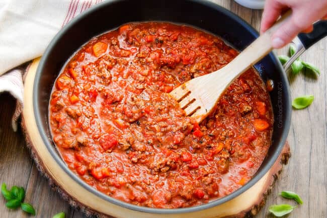 One Skillet Cheesy Penne - the best homemade ragu sauce simmered right with the pasta then loaded with cheese! My family begs me to make this weekly!