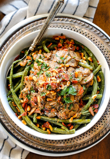 Roasted Green Beans with Cremini Bacon Mushroom Sauce - these beans are amazing! wonderfully flavorful, crisp tender and the silky Cremini Bacon Mushroom Sauce is out of this world! If you are looking for an alternative to green bean casserole, this is it! #thanksgiving