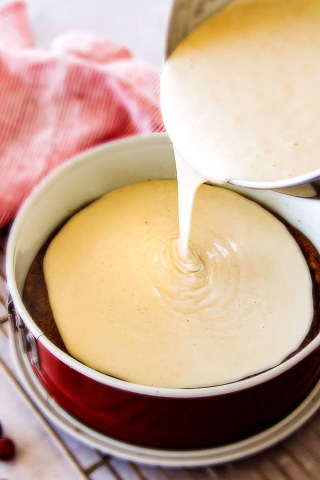 Showing the layers being poured for the Cranberry Eggnog Cheesecake.