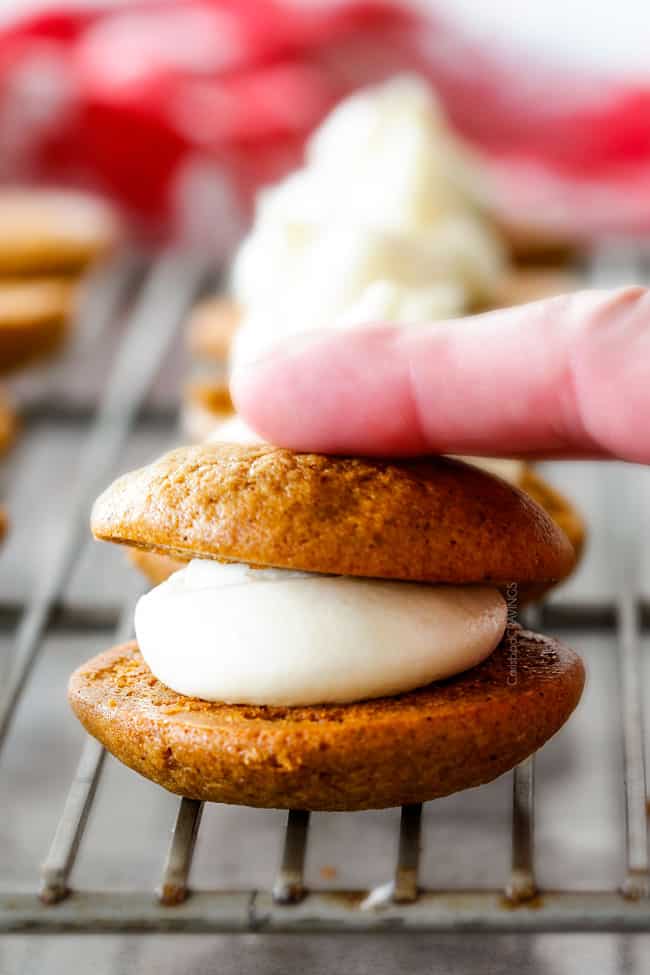 showing how to make Whoopie Pies by adding cookie on top of filling