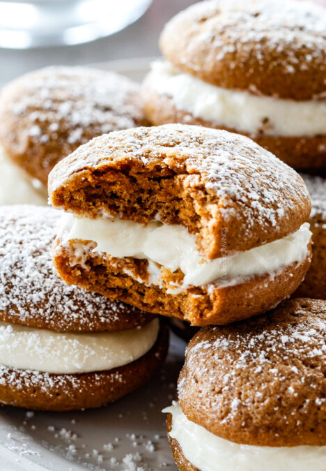 Gingerbread Whoopie Pies - everyone always begs me for this recipe! Super soft gingerbread cookies stuffed with luscious cream cheese filling! You won't be able to have just one!