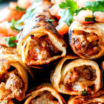 Crispy Jalapeno Popper Beef Taquitos bursting with irresistible creamy, cheesy spicy beef filling (customizable) all cocooned in crispy tortillas and done in less than 30 mintues! These are my husband's favorite ever appetizer and I couldn't stop eating them! Perfect game day any party appetizer!