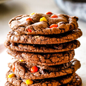 These Super soft and chewy Nutella Cookies are my absolute favorite chocolate cookie with a whole cup of Nutella mixed right into the batter! Mix in anything you want from chocolate chips to, Reese's pieces to Andes mints for the perfect Christmas cookie!
