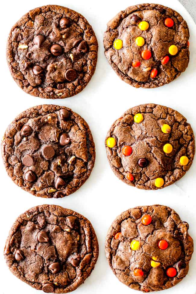 These Super soft and chewy Nutella Cookies are my absolute favorite chocolate cookie with a whole cup of Nutella mixed right into the batter! Mix in anything you want from chocolate chips to, Reese's pieces to Andes mints for the perfect Christmas cookie! top view of chewy nutella cookies, 3 with chocolate chips on the left and three with peanut butter chips on the right