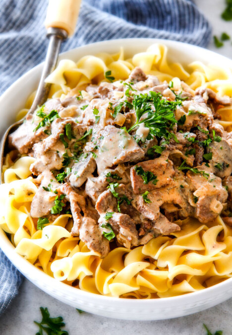 This is by far my family's favorite Slow Cooker Beef Stroganoff recipe! An ultra rich and creamy, amazingly flavorful sauce (without any "cream of" anything!), crazy tender meat all made in the crockpot for a gourmet meal with hardly any effort! I love serving this for holidays like Christmas!