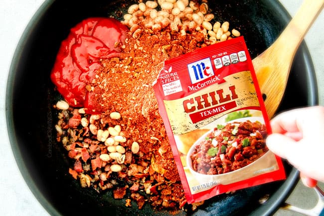 Showing how to make Boston Baked Bean Dip adding chili tex-mex McCormick spice packet.