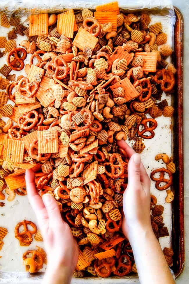 Make ahead crunchy, salty, savory Italian Parmesan Party Mix bursting with Italian flavor in each cashew, pretzel, chex mix bite! This is my go-to party snack that everyone begs me to make!
