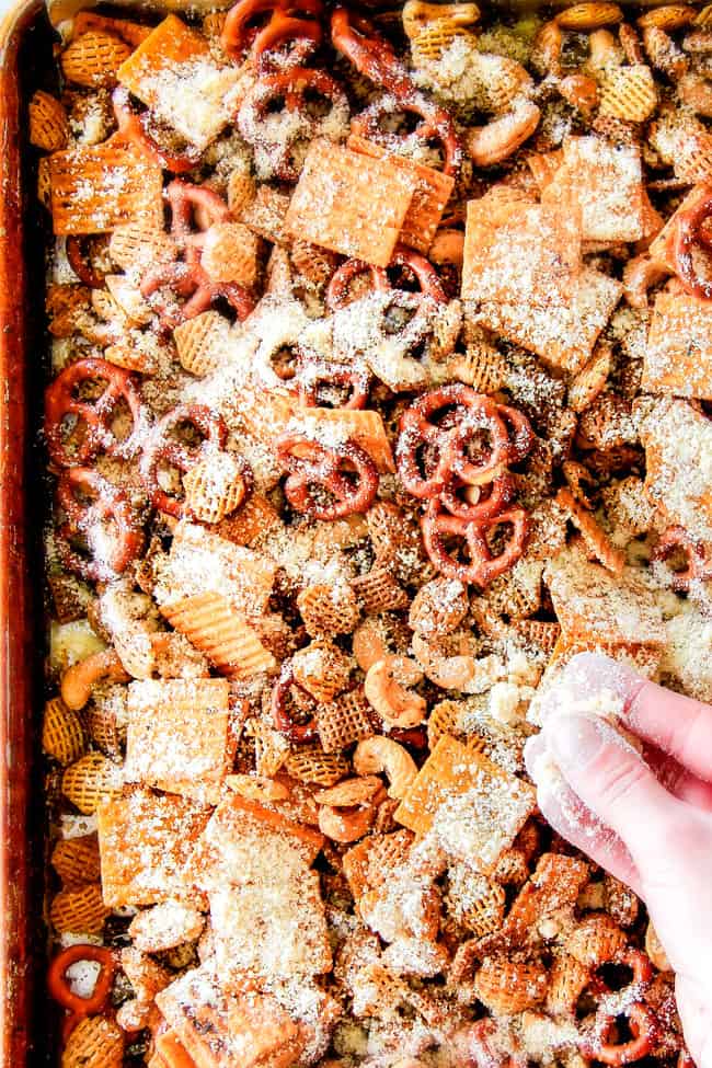 Make ahead crunchy, salty, savory Italian Parmesan Party Mix bursting with Italian flavor in each cashew, pretzel, chex mix bite! This is my go-to party snack that everyone begs me to make!