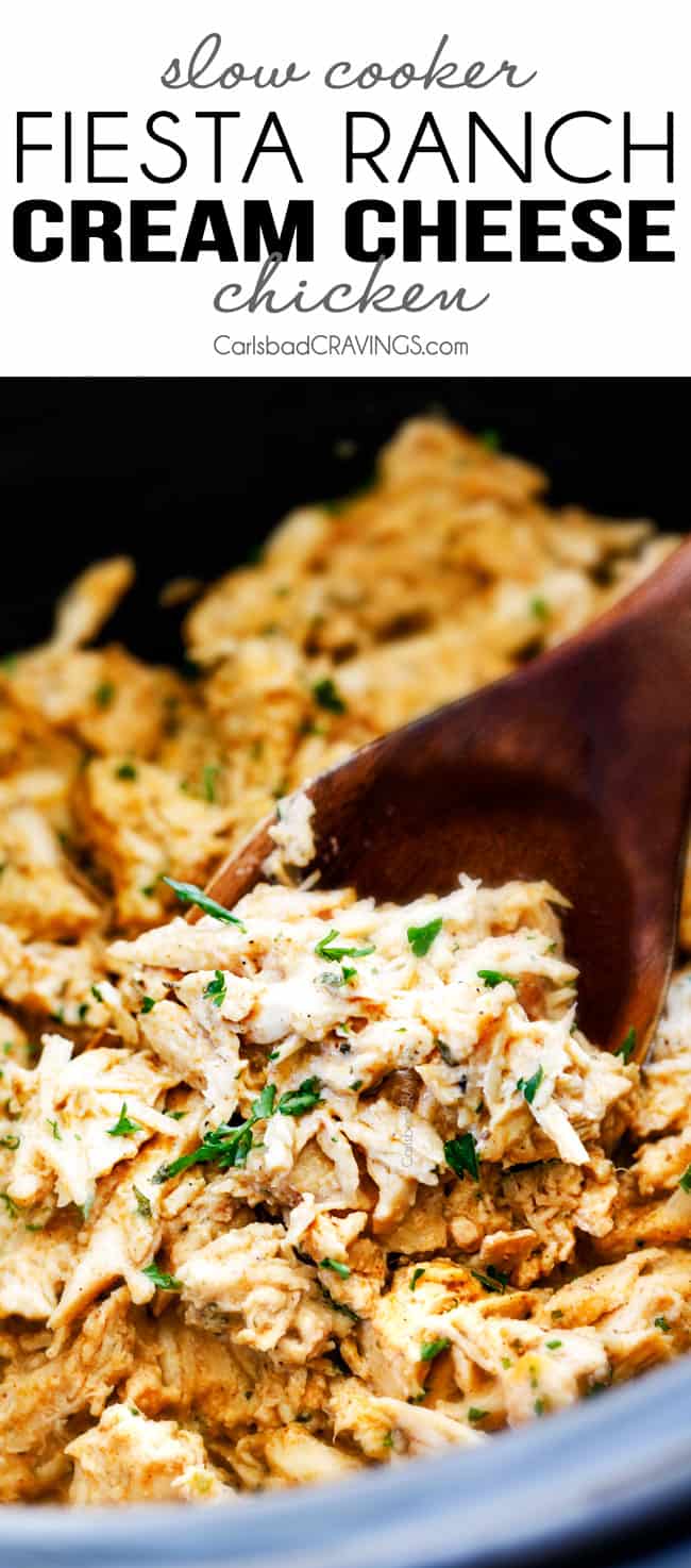 up close of a wooden spoon scooping up crockpot cream cheese chicken
