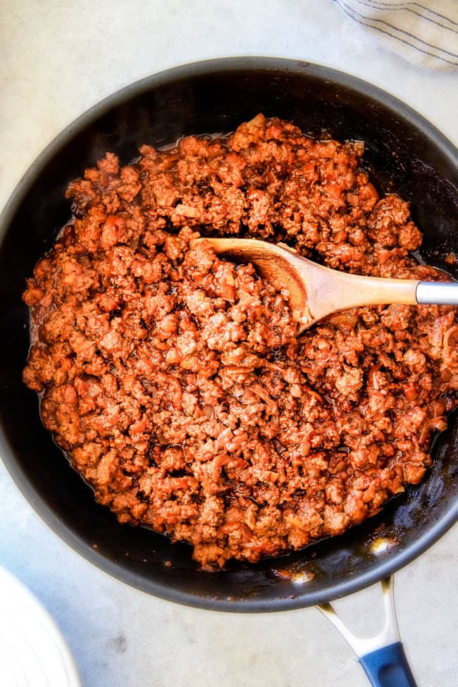 showing how to make sloppy Joes by simmering filling in a skillet