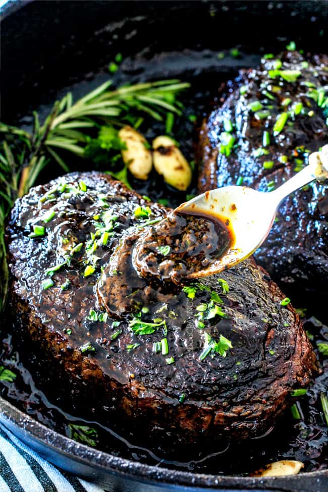 Pouring sauce over Pan Seared Steak with Balsamic Herb Cream Sauce.
