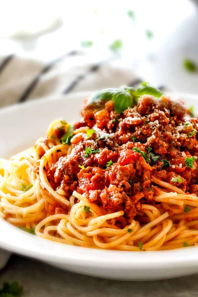 Quick and easy Weeknight Spaghetti Bolognese bursting with flavor on your table in under 30 minutes but tastes like its been simmering all day! We make this recipe more than ANY OTHER RECIPE!