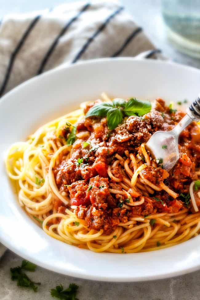 Quick and easy Weeknight Spaghetti Bolognese bursting with flavor on your table in under 30 minutes but tastes like its been simmering all day! We make this recipe more than ANY OTHER RECIPE!