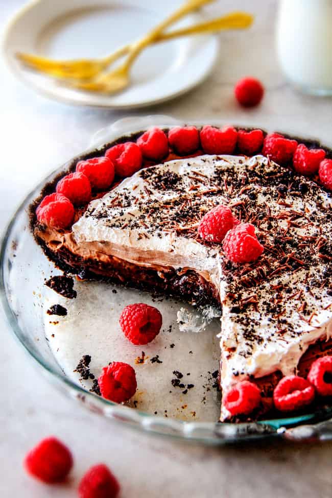 Wonderfully rich, crazy creamy, heavenly Mississippi Mud Pie with 4 EASY layers of decadence! Everyone will beg you for this TO LIVE FOR recipe! traditional mud pie with oreo crust, fudge chocolate sauce, chocolate pudding and cool whip