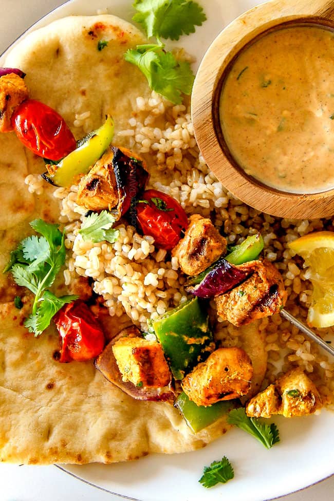 Tandoori Chicken Kabobs over rice.