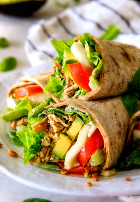 15 MINUTE Avocado Caprese Chicken Wraps  - I am completely addicted to these wraps and they are totally easy and healthy! they are loaded with the most amazing balsamic chicken, juicy tomatoes, milky mozzarella, creamy avocadoes, crunchy romaine, fresh basil and crispy bacon all wrapped in a soft flatbread.  seriously, to die for! 
