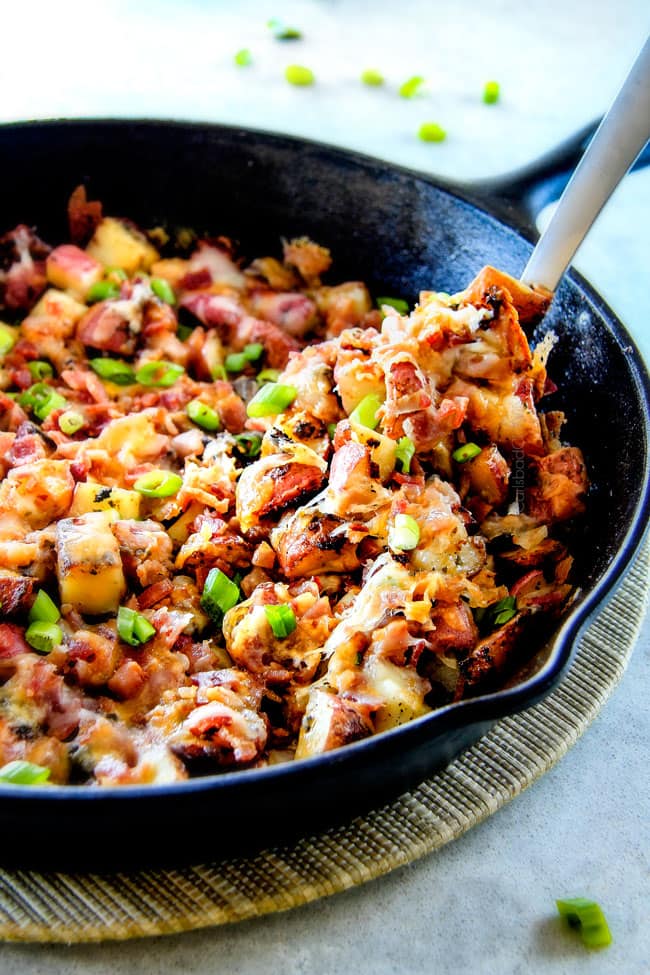 These EASY Baked or Grilled Cheesy Potatoes with Bacon are so ADDICTING! they are perfectly spiced, ssooooo cheesy and I love the soft centers and crispy edges! Tastes like potato skins but better!