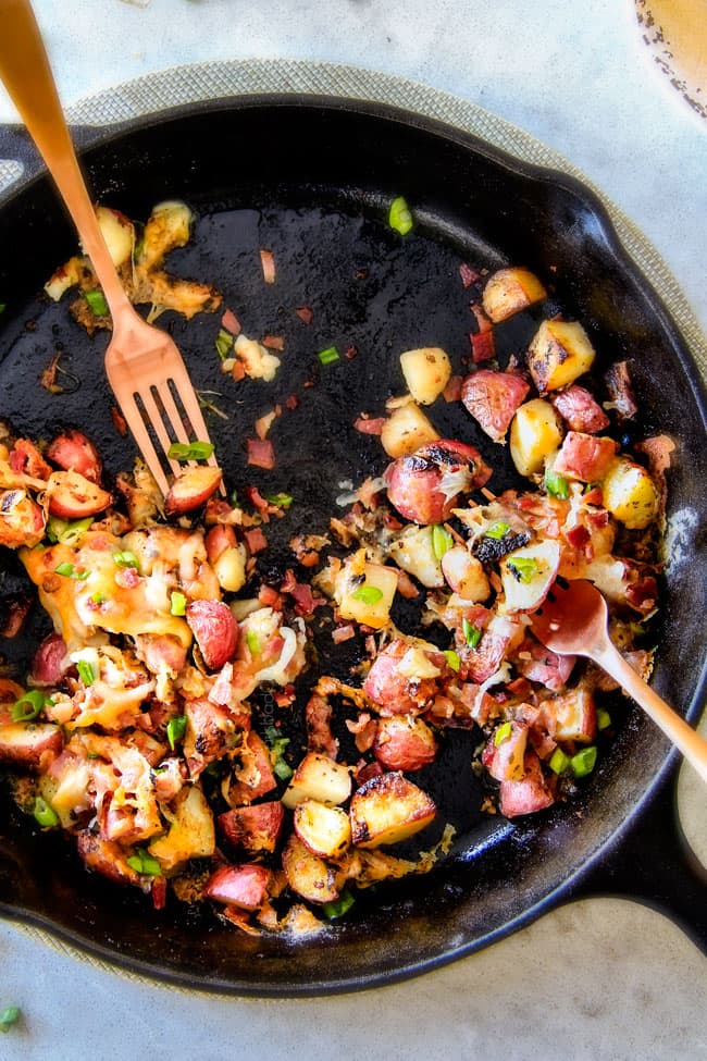 These EASY Baked or Grilled Cheesy Potatoes with Bacon are so ADDICTING! they are perfectly spiced, ssooooo cheesy and I love the soft centers and crispy edges! Tastes like potato skins but better!