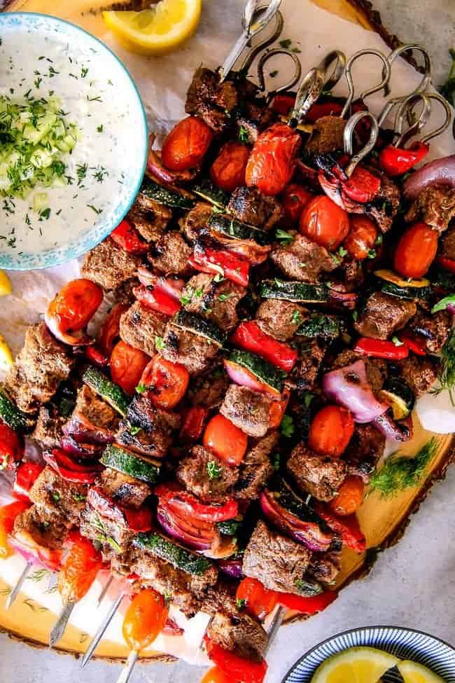 These easy Baked or Grilled Greek Beef Kabobs are so crazy juicy and exploding with flavor in every mouthwatering bite! And the creamy, refreshing Whipped Feta Whipped Feta Tzatziki Dip is out of this world!
