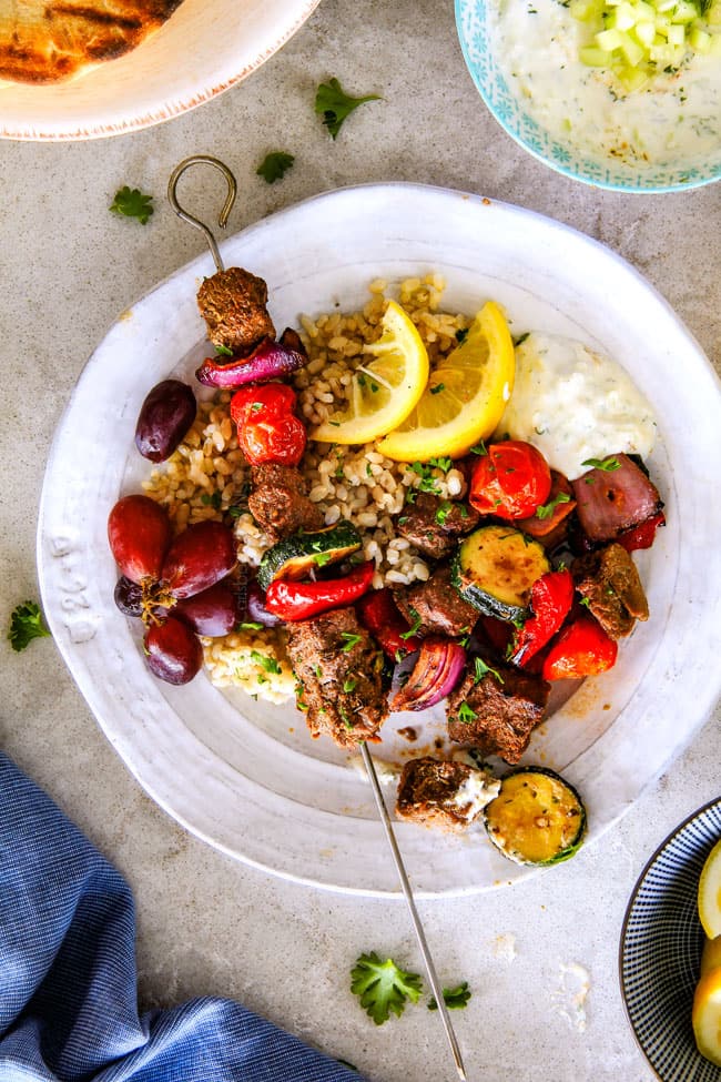 These easy Baked or Grilled Greek Beef Kabobs are so crazy juicy and exploding with flavor in every mouthwatering bite! And the creamy, refreshing Whipped Feta Whipped Feta Tzatziki Dip is out of this world!