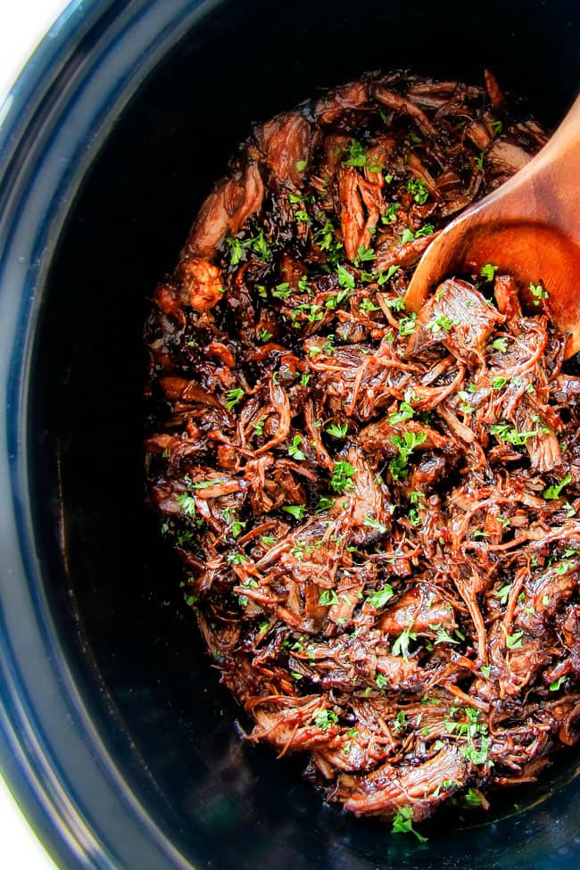 I am obsessed with this sweet and tangy, savory Slow Cooker Honey Balsamic Beef!!! It's fall apart tender, crazy juicy, packed with flavor and smothered in the most AMAZING honey balsamic sauce! perfect for sandwiches or stand alone delicious with rice and potatoes! moist slow cooker roast beef without vegetables in a crockpot