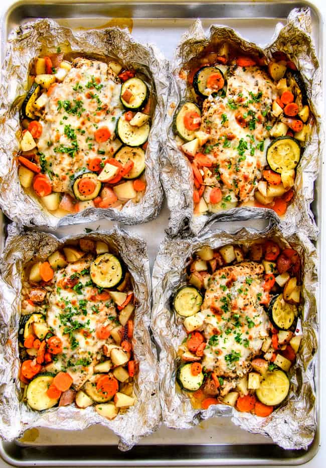 Baked or Grilled Italian Mozzarella Chicken Foil Packets are bursting with astonishingly juicy, flavorful chicken and tender, seasoned Potatoes, Carrots and Zucchini all smothered with Mozzarella Cheese! These foil packets are meal-in-one that are quick to throw together and even quicker to clean up!