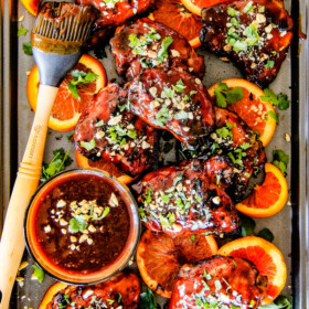 this Thai Orange Peanut Chicken (Grilled or Baked) is phenomenal! Its one of my favorite sweet, tangy savory chicken recipes ever! the chicken is soooooo juicy and the sauce is out of this world!