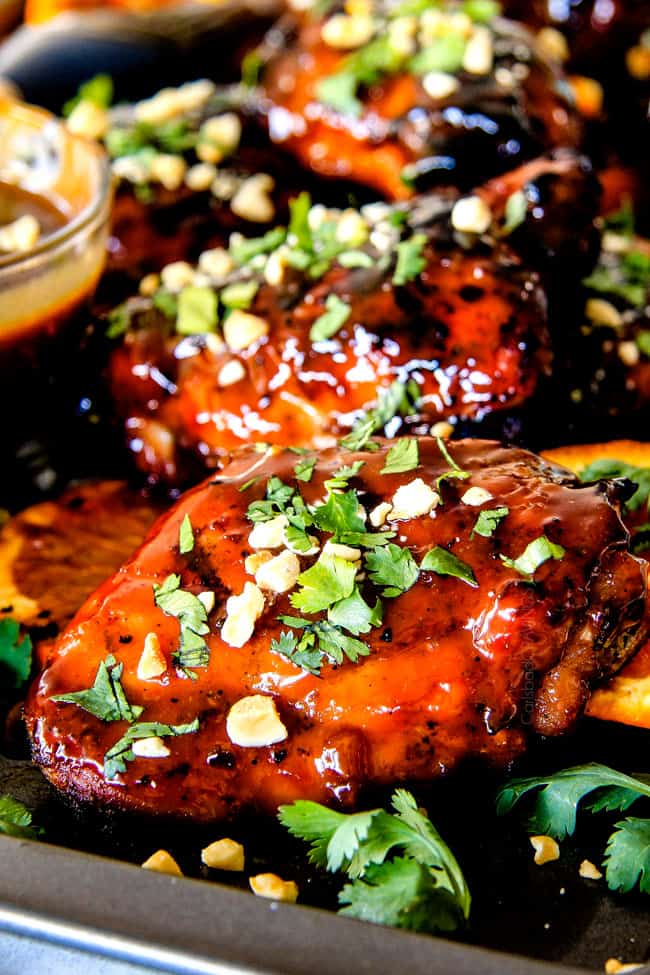 this Thai Orange Peanut Chicken (Grilled or Baked) is phenomenal! Its one of my favorite sweet, tangy savory chicken recipes ever! the chicken is soooooo juicy and the sauce is out of this world!