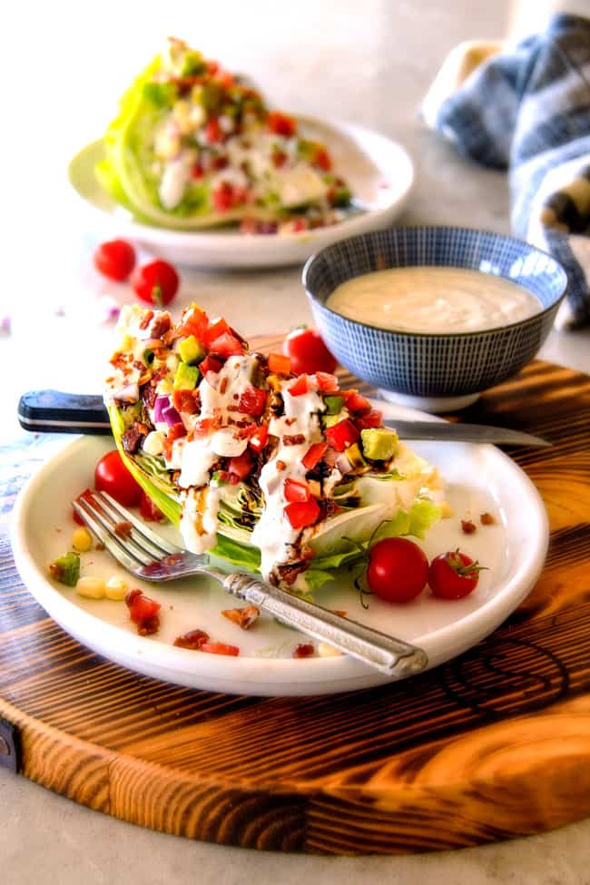 Outback Copycat Wedge Salad smothered in the most amazing creamy, decadent Blue Cheese Ranch and Balsamic Reduction is a flavor/texture lovers dream and crazy easy to make! Outback Wedge Salad smothered in the most amazing creamy, decadent Blue Cheese Ranch and Balsamic Reduction is a flavor/texture lovers dream and crazy easy to make!