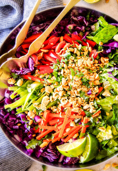 This Crunchy Asian Salad with Sriracha peanut Dressing is CRAZY GOOD!   The combination of texures is amazing and the dressing is absolutely addicting!  This salad is so good I was actually eating leftovers for breakfast! 