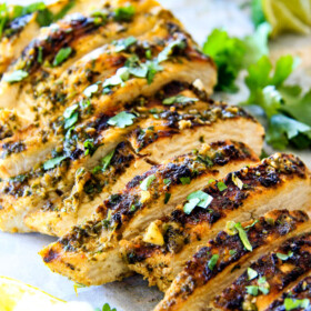 Easy, juicy, flavorful Cilantro Lime Chicken seeping with flavor is a meal in itself or instantly transforms salads, tacos, burritos, wraps, etc into the most epic meal EVER! I love having this chicken on hand!