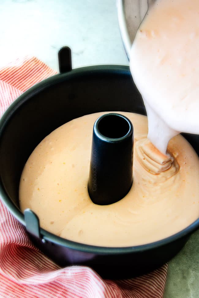 Showing how to make Pink Lemonade Pound Cake pouring batter in a pan.
