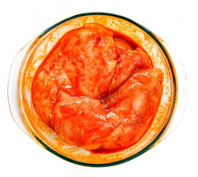 EASY Baked or Grilled Cheesy Buffalo Chicken Foil Packets bursting with juicy chicken and tender, flavorful veggies all smothered in cheddar and dipped in Ranch Crema! these are SO addictingly delicious!!!