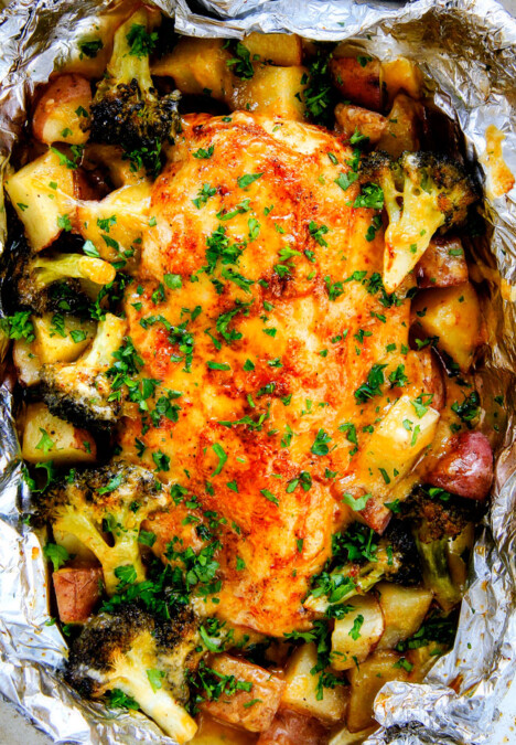 EASY Baked or Grilled Cheesy Buffalo Chicken Foil Packets bursting with juicy chicken and tender, flavorful veggies all smothered in cheddar and dipped in Ranch Crema!  these are SO addictingly delicious!!!   