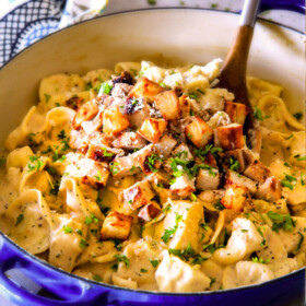 This Creamy Caesar Chicken Tortellini is SO addicting! My family raved about it for days! Its wonderfully cheesy, garlicky, lemony, & perfect with tortellini and juicy chicken! I will be using the chicken marinade just plain too its so good!