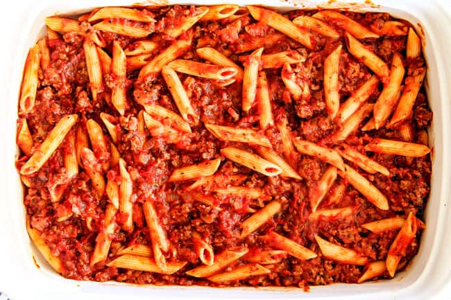 This Million Dollar Baked Penne has been a family favorite for decades! We serve it at all our family gatherings because its SO good, so easy! The homemade sauce is incredible and the hidden layer of creamy/cheesiness is to live for!