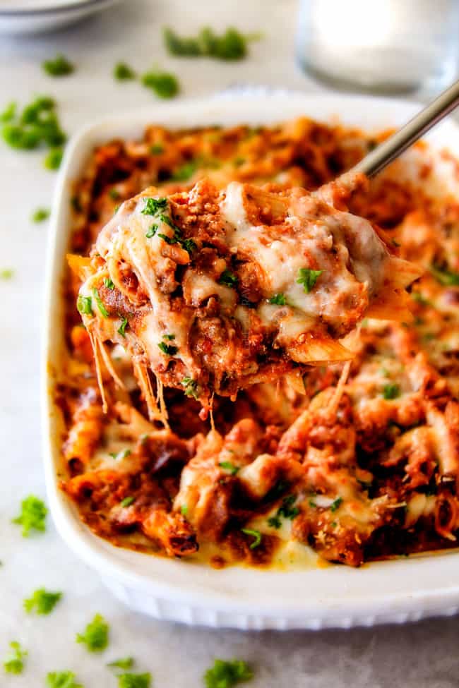 This Million Dollar Baked Penne has been a family favorite for decades! We serve it at all our family gatherings because its SO good, so easy! The homemade sauce is incredible and the hidden layer of creamy/cheesiness is to live for!