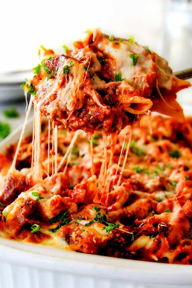 This Million Dollar Baked Penne has been a family favorite for decades! We serve it at all our family gatherings because its SO good, so easy! The homemade sauce is incredible and the hidden layer of creamy/cheesiness is to live for!