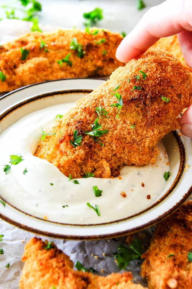 Baked Cheddar Ranch Chicken Tenders with ranch dipping sauce.