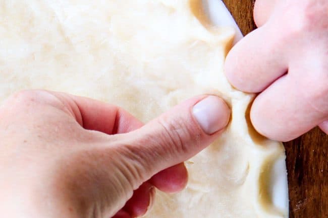 showing how to make pie crust by fluting edges