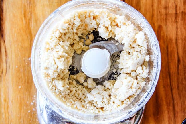 showing how to make pie crust by pulsing with ice water