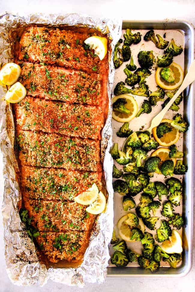25 MINUTE Baked Lemon Garlic Butter Salmon with Crispy Parmesan Panko & Broccoli! This salmon is not only bursting with flavor and sooo juicy and tender but the easiest, most satisfying meal that tastes totally gourmet! My parents were blown away by this meal! far away top view of oven baked salmon with broccoli