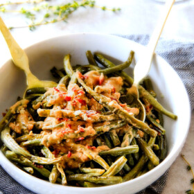 Forget green bean casserole, these wonderfully flavorful, crisp tender Roasted Green Beans with Creamy Gruyere Sauce are AMAZING!!! They the best green beans you will ever eat! They are easy enough for every day but delicious enough for special occasions (like Thanksgiving, Christmas!)!