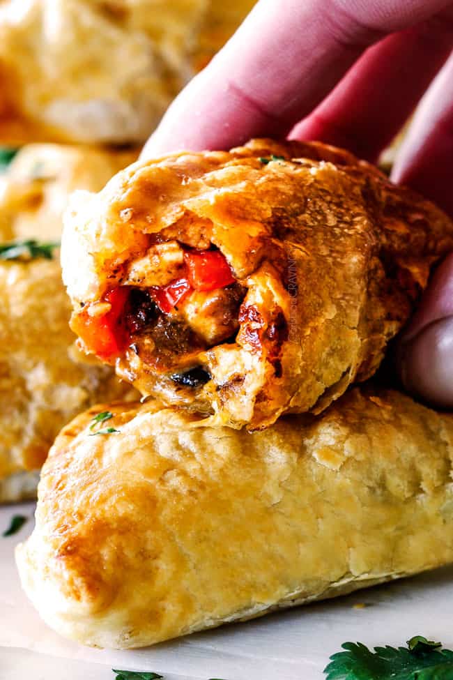 Close up of Chipotle Chicken Empanadas with a bite missing.