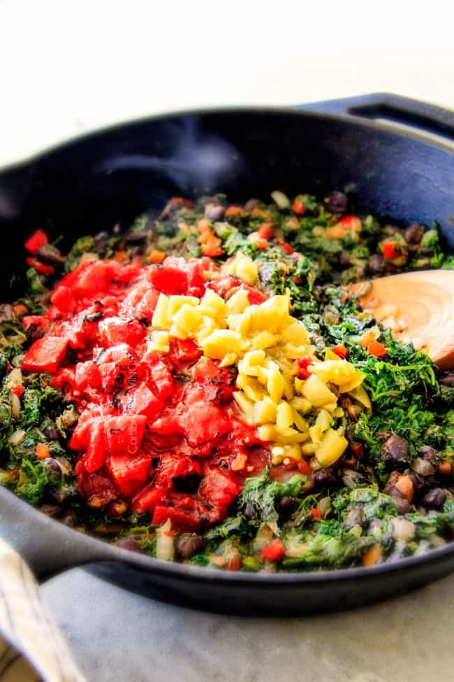 Mixing ingredients for Cheesy Mexican Spinach Dip.