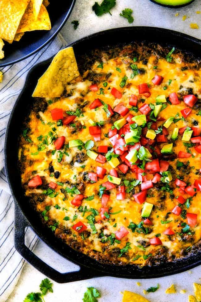 Cheesy Mexican Spinach Dip in cast iron skillet.