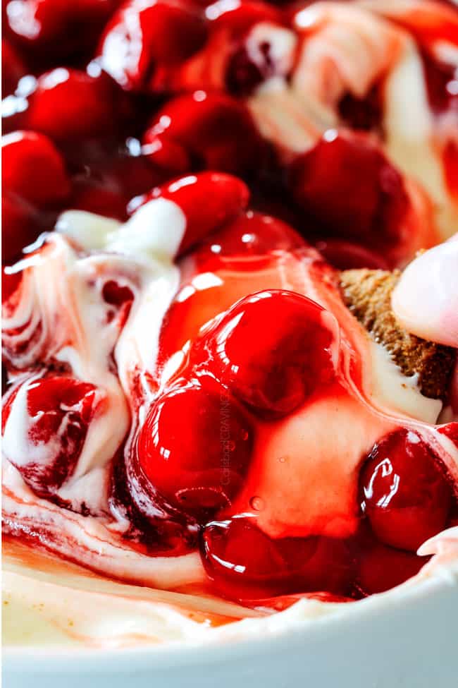 Close up of Cherry Cheesecake Dip with gingersnap cookies.